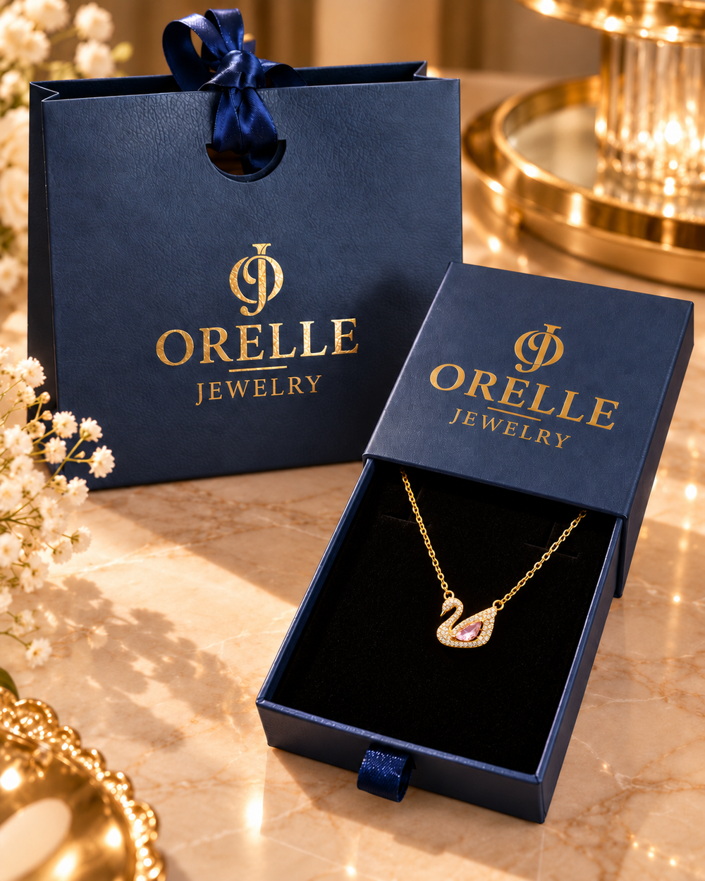 Gold-Tone Pink Swan Necklace in Orelle packaging