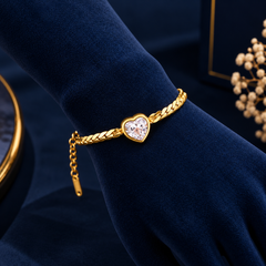 Gold-Tone Heart Crystal Bracelet on navy velvet display