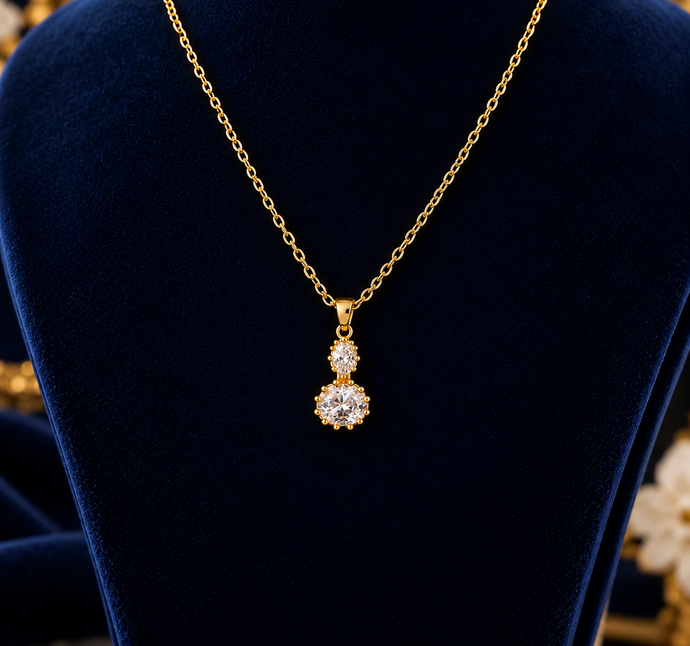Golden Duo Crystal Necklace on navy velvet display
