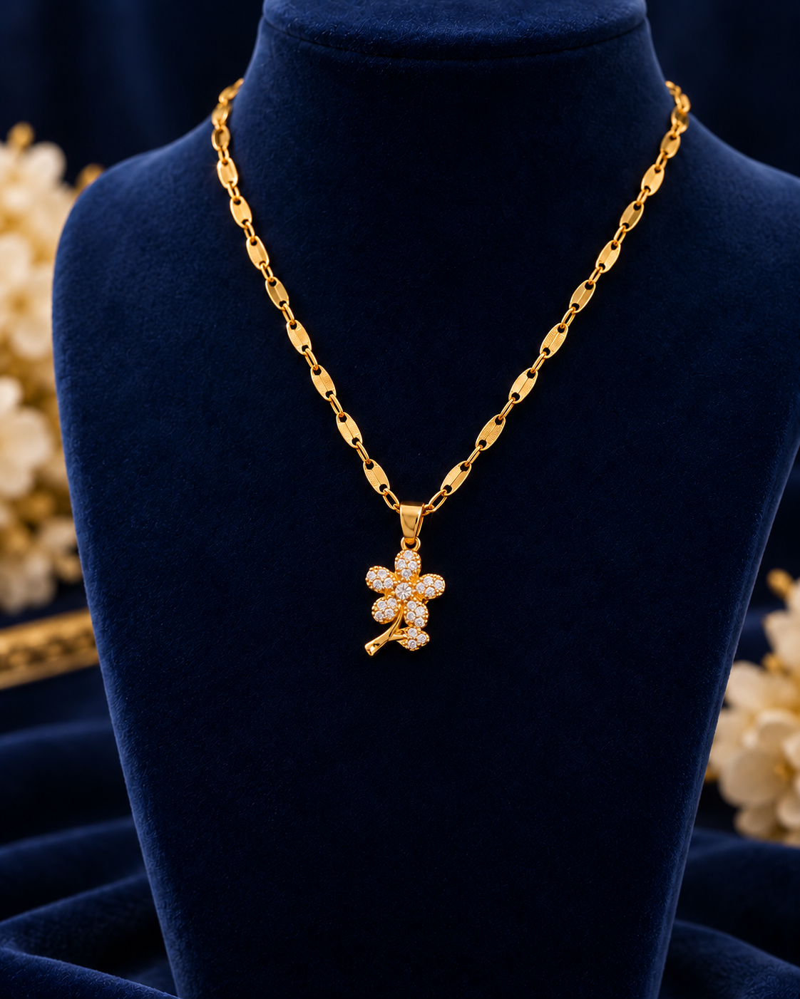 Gold-Tone Crystal Blossom Necklace on navy velvet display