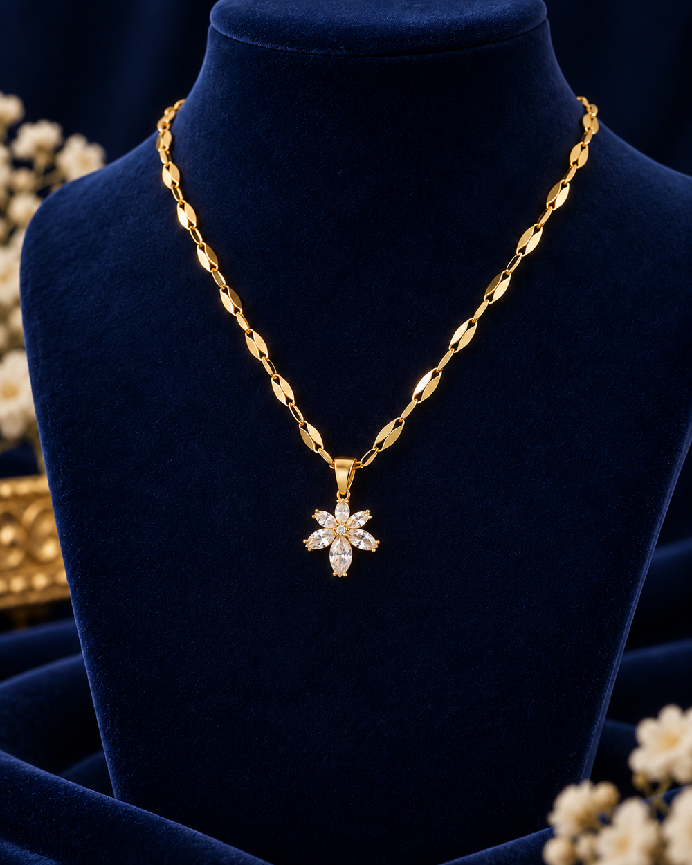 Gold-Tone Crystal Daisy Necklace on navy velvet display