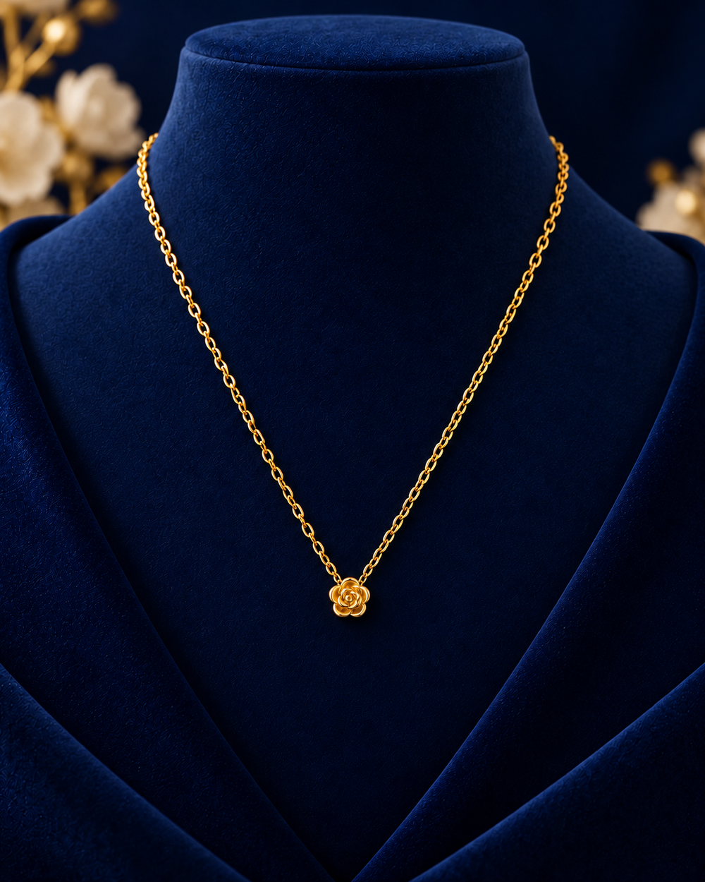 Gold-Tone Mini Flower Necklace on navy velvet display