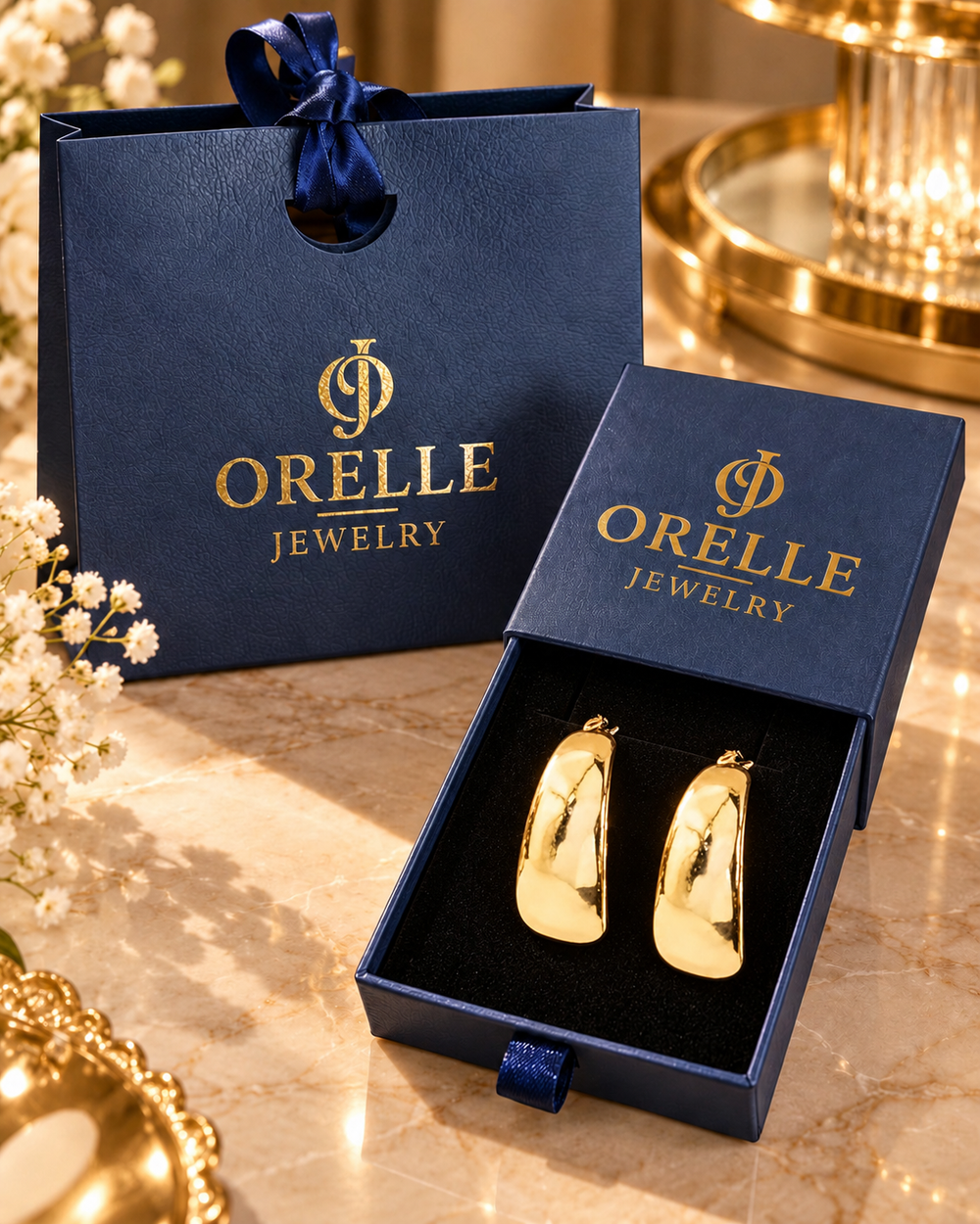 Gold-Tone Wide Polished Hoop Earrings in Orelle packaging