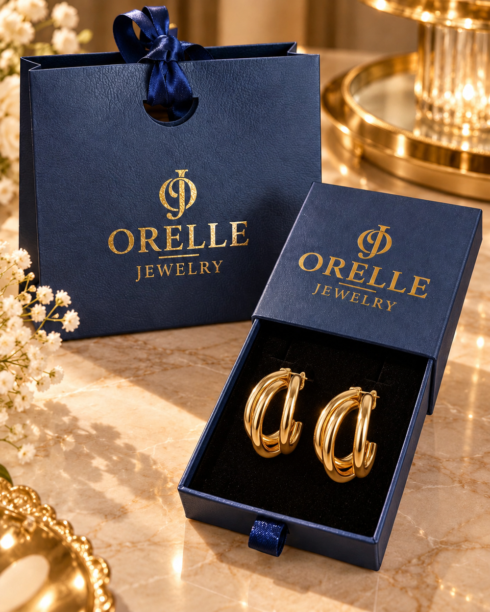 Gold-Tone Double Loop Hoop Earrings in Orelle packaging