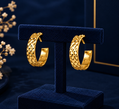 Gold-Tone Woven Texture Hoop Earrings on navy velvet display