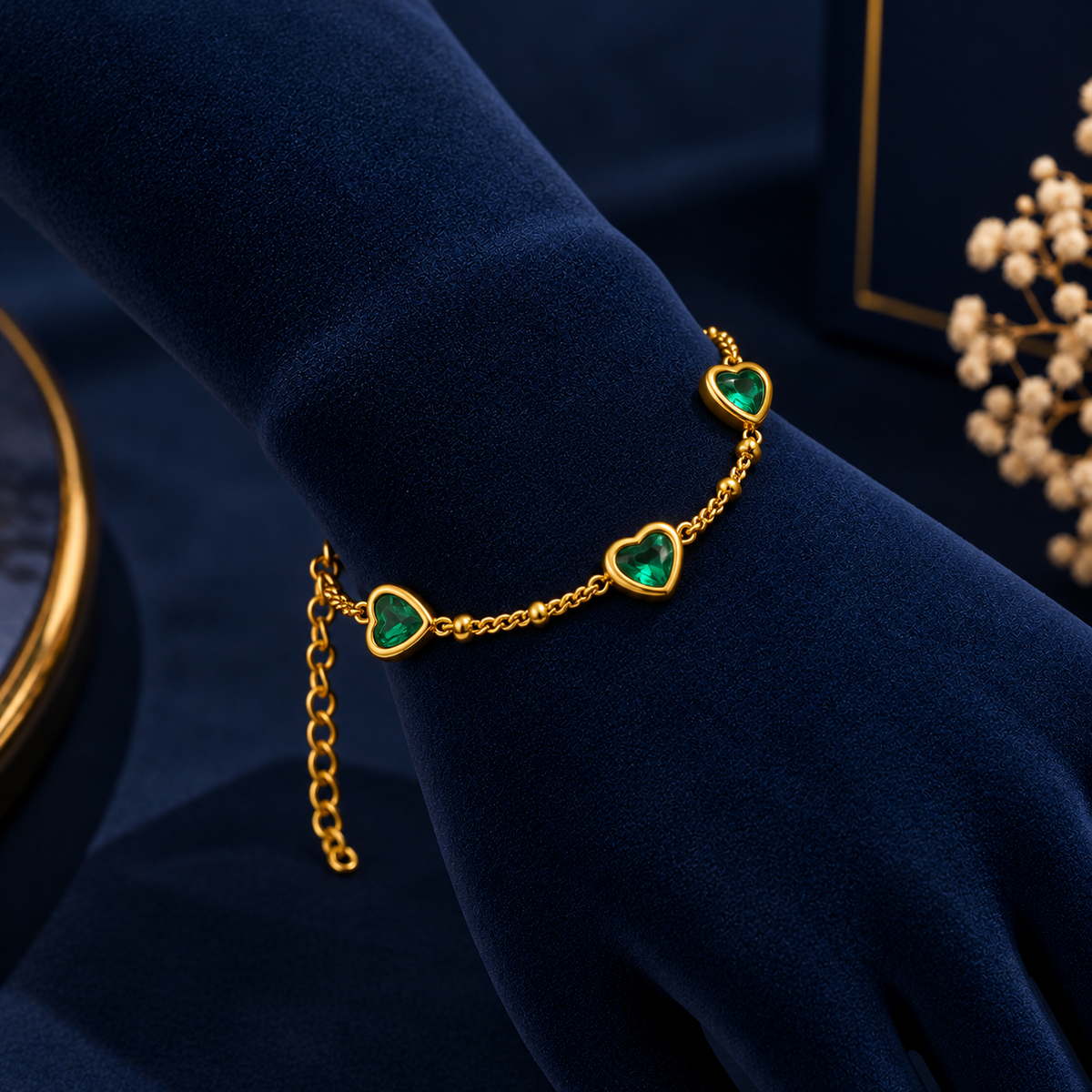 Gold-Tone Green Crystal Bracelet on navy velvet display