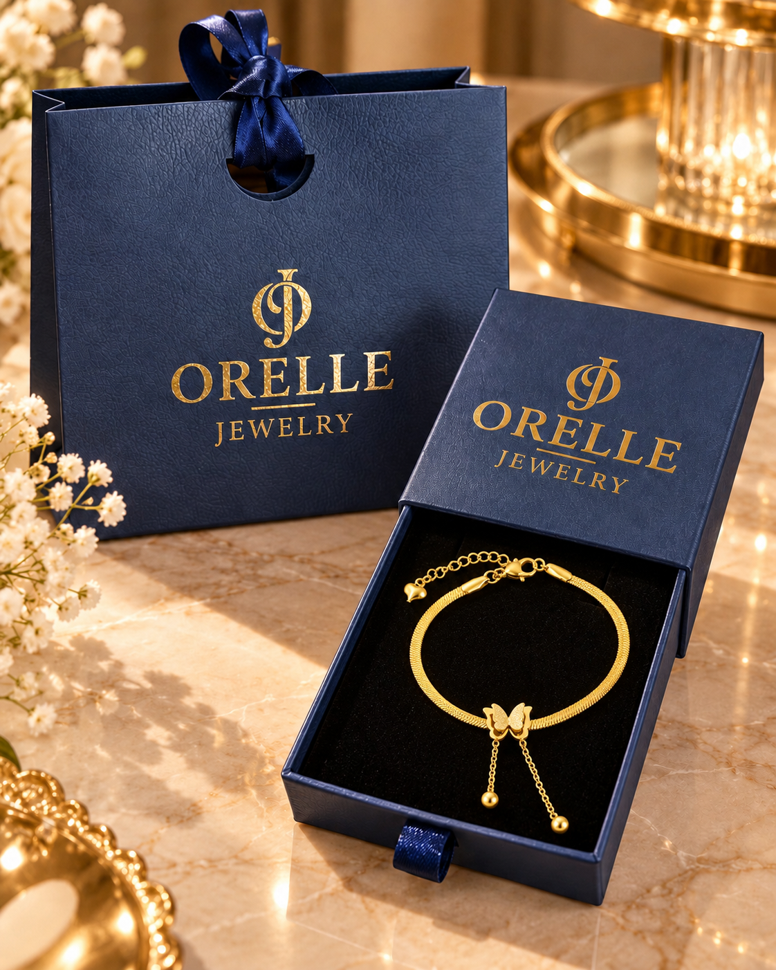 Gold-Tone Butterfly Drop Bracelet in Orelle packaging