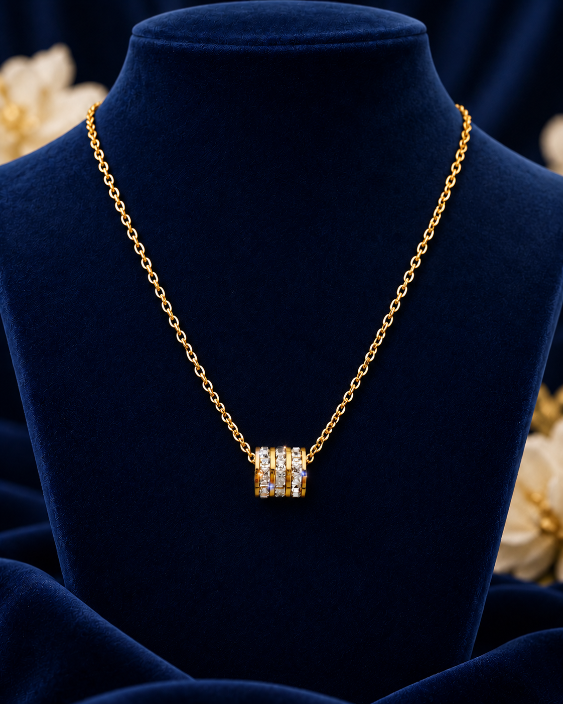 Gold-Tone Crystal Ring Necklace on navy velvet display