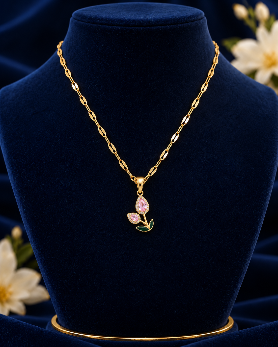 Gold-Tone Pink Tulip Necklace on navy velvet display