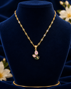 Gold-Tone Pink Tulip Necklace on navy velvet display