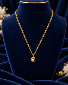 Gold-Tone Pearl Pendant Necklace on navy velvet display