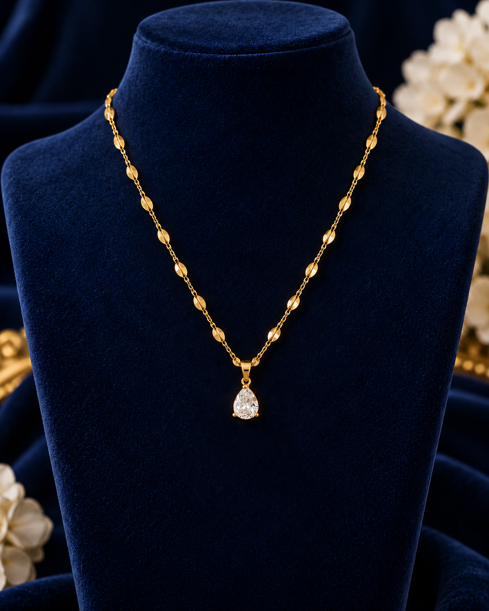 Gold-Tone Solitaire Drop Necklace on navy velvet display