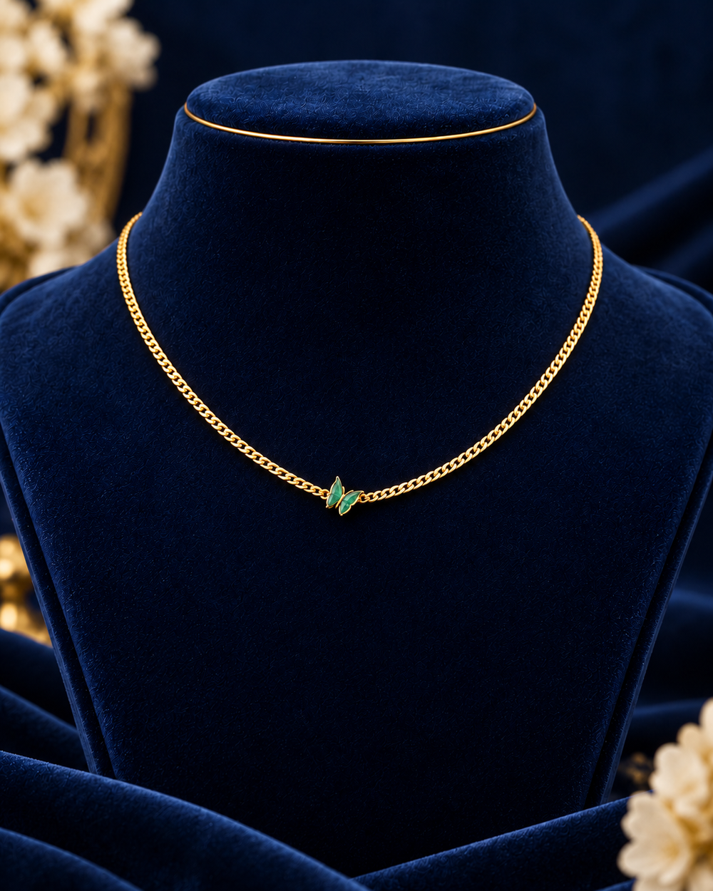 Gold-Tone Green Butterfly Necklace on navy velvet display