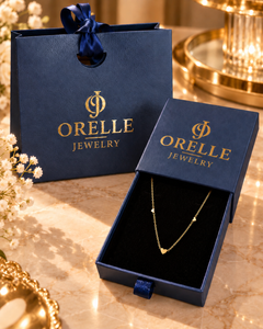 Gold-Tone Mini Heart Charm Necklace in Orelle packaging