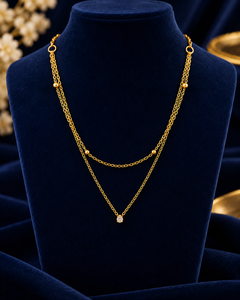 Gold-Tone Layered Crystal Necklace on navy velvet display