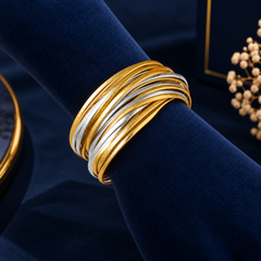 Gold-Tone & Silver-Tone Multi-Strand Bracelet With Magnetic Clasp on navy velvet display