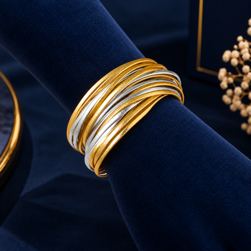 Gold-Tone & Silver-Tone Multi-Strand Bracelet With Magnetic Clasp on navy velvet display