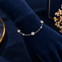 Silver-Tone Roman Numeral Crystal Bracelet on navy velvet display