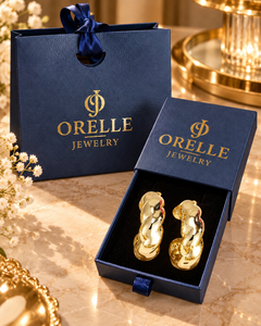 Gold-Tone Organic Twist Hoop Earrings in Orelle packaging