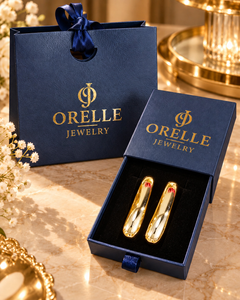 Gold-Tone Elongated Oval Hoop Earrings in Orelle packaging