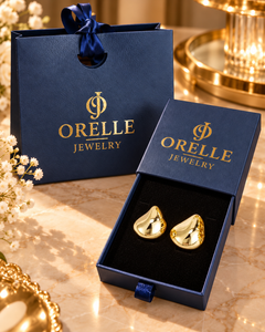 Gold-Tone Sculpted Dome Stud Earrings in Orelle packaging