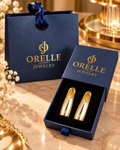 Gold-Tone Oval Tube Hoop Earrings in Orelle packaging