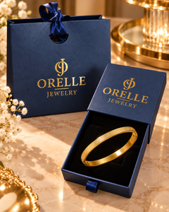 Gold-Tone Greek Key Bracelet inside Orelle gift packaging