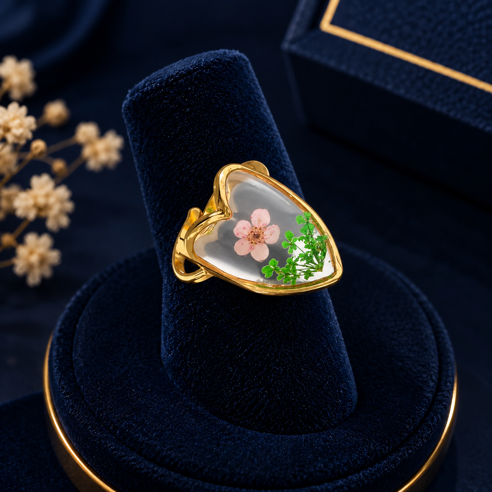 Gold-Tone Floral Heart Ring on navy velvet