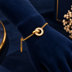 Gold-Tone Double Ring Crystal Bracelet on navy velvet