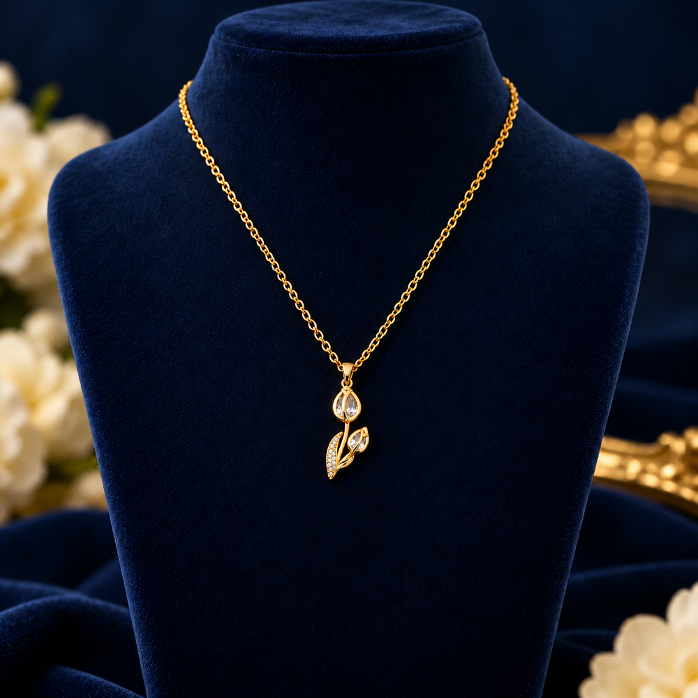 Gold-Tone White Crystal Tulip Necklace on navy velvet